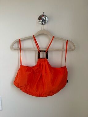 STAUD Bright Orange Cropped Halter Top with Tortoiseshell Accent